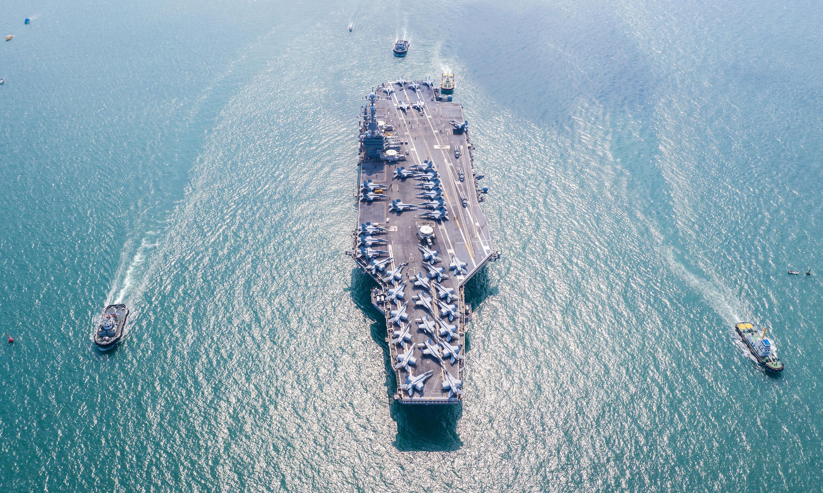 Aerial view of aircraft carrier on the ocean